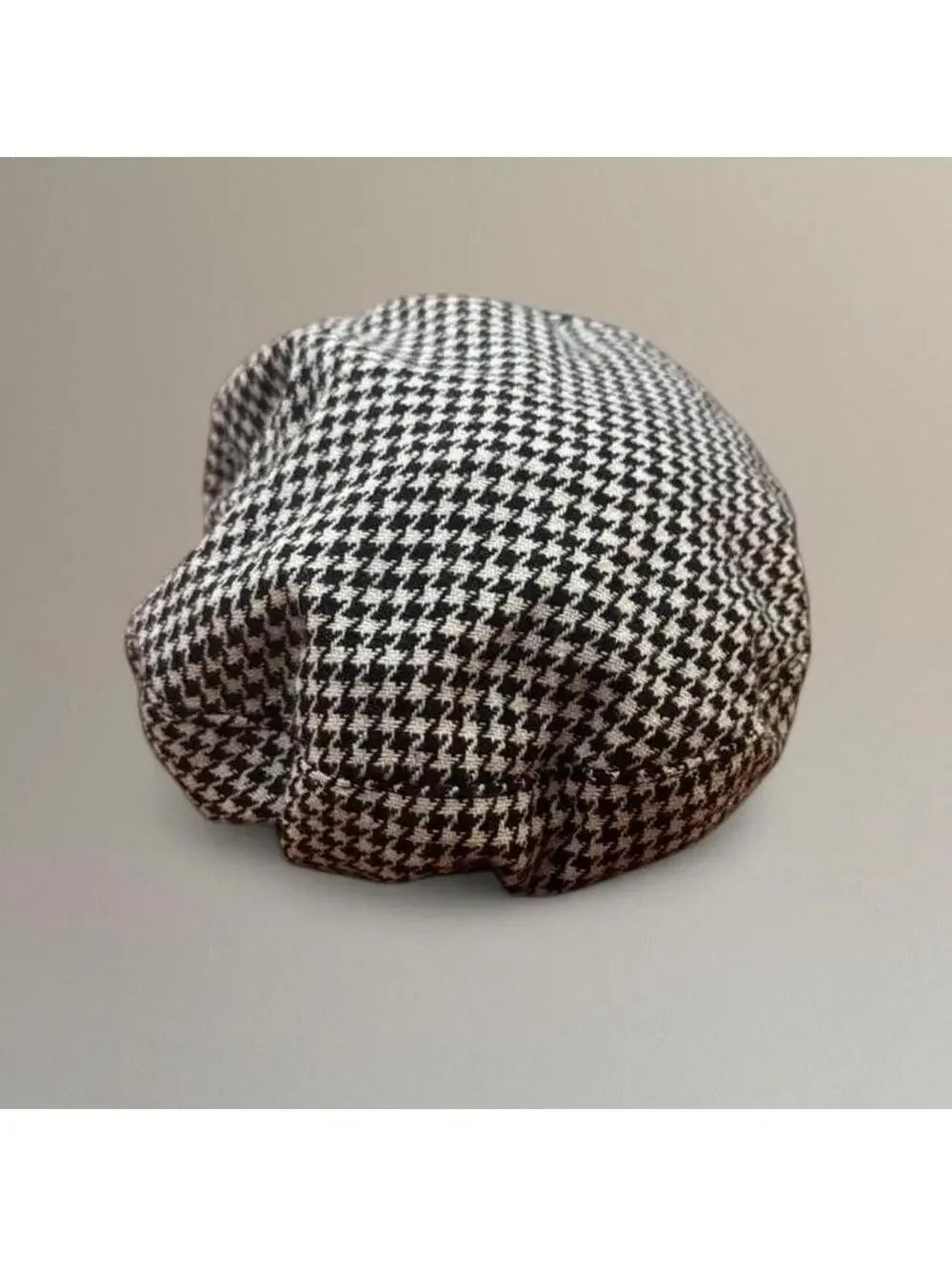 Houndstooth newsboy cap.